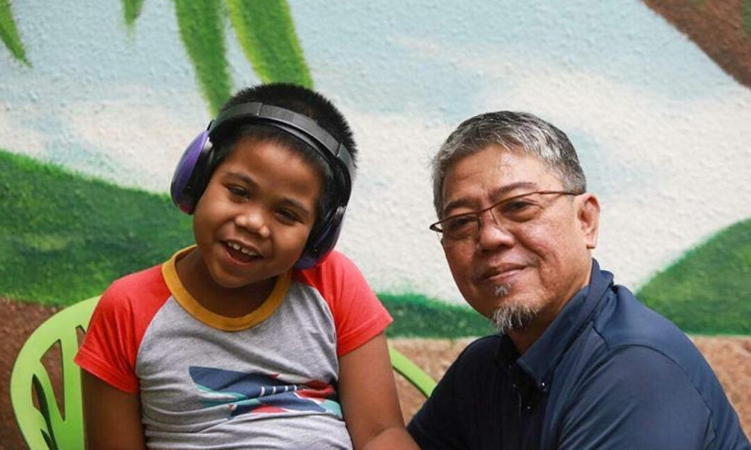 It was hard whenever we saw a family’: Single father of four finds help from caregiver programme