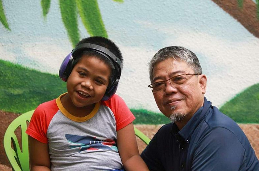 It was hard whenever we saw a family’: Single father of four finds help from caregiver programme